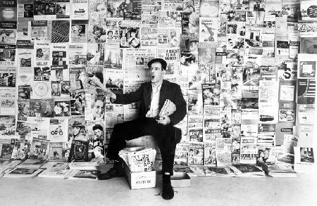 Newspaper salesman, c.1960