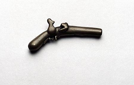 Gold weight cast in the form of a pistol de Akan School