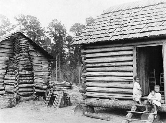 Log cabins in Thomasville, Florida, c.1900 de American Photographer