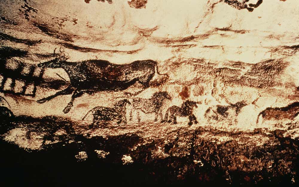 Rock painting of a leaping cow and a frieze of small horses de Anonymous