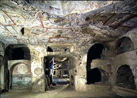 Interior of a catacomb chamber cut from tufa stone showing fragments of frescoed decoration de Anonymous