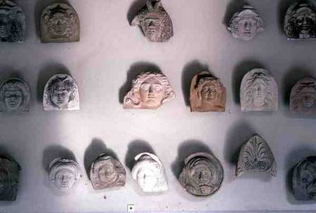 Terracotta Faces de Anonymous