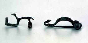 Two fibulae in the shape of animals, from Bragny sur Saone,La Tene style