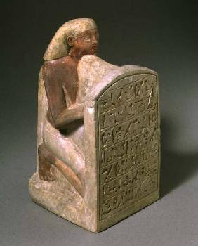 N507 Kneeling male figure holding a stela Egyptian