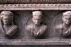 Three Palmyrian busts on a sarcophagus
