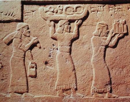 Relief depicting porters laden with gifts de Assyrian