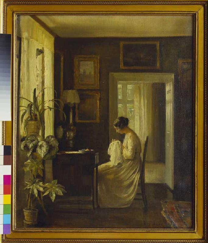 Interior with a sewing woman. de Carl Holsoe