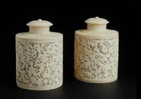 Pair of carved ivory canisters and covers