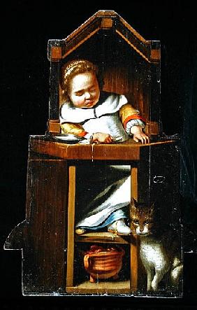 Dummy board depicting a boy asleep in a high chair