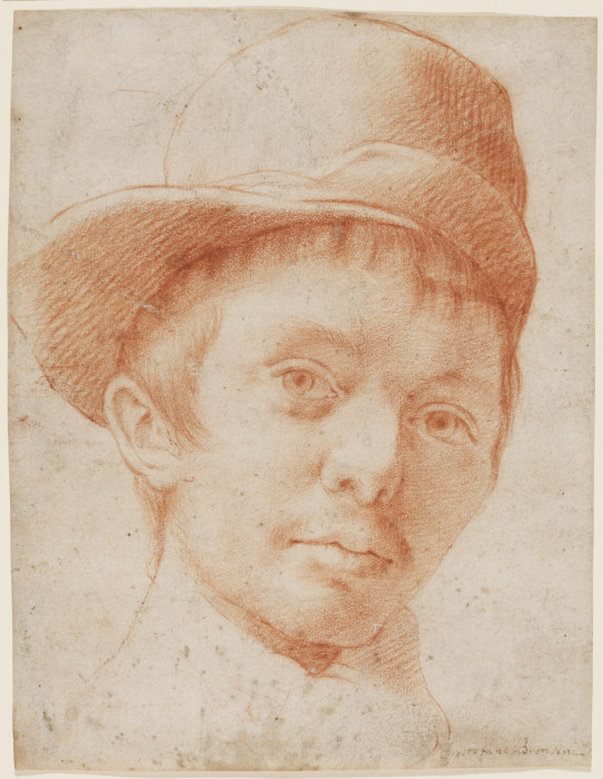 A boy wearing a workmans hat de Cristofano Allori