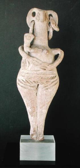 Figurine of a nude woman holding a child