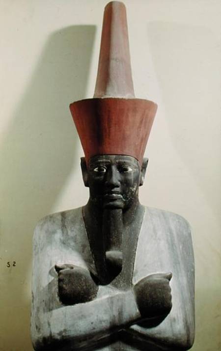 Detail of a statue of Mentuhotep II, enthroned and wearing the red crown of Lower Egypt, taken from de Egyptian