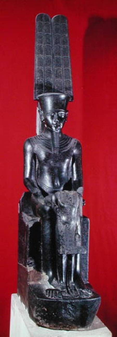 Seated statue of the god Amon protecting Tutankhamun, New Kingdom de Egyptian