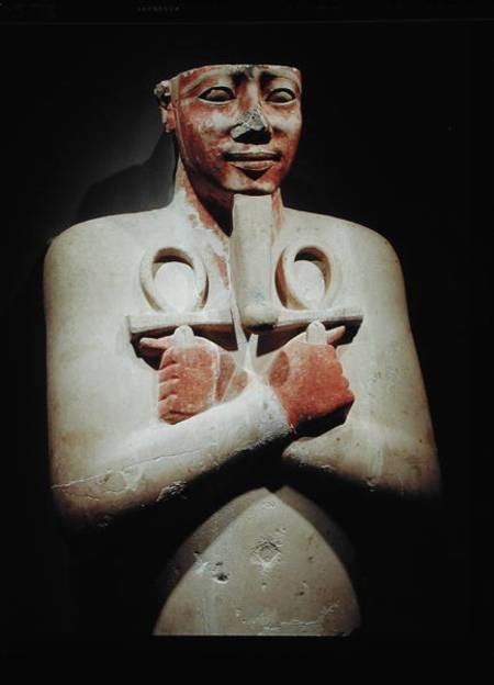 Statue of Sesostris I (c.1918-1875 BC) holding the ankh in both hands crossed over his chest, from t de Egyptian