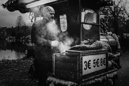 Hot roasted chestnut street vendor