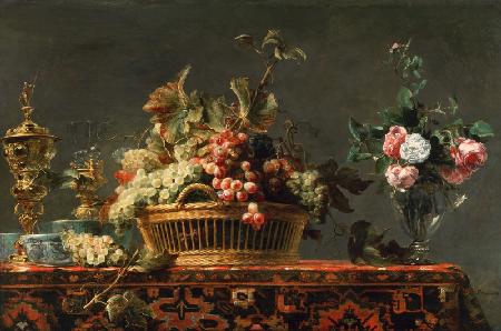 Quiet life with basket with grapes and a rose vase