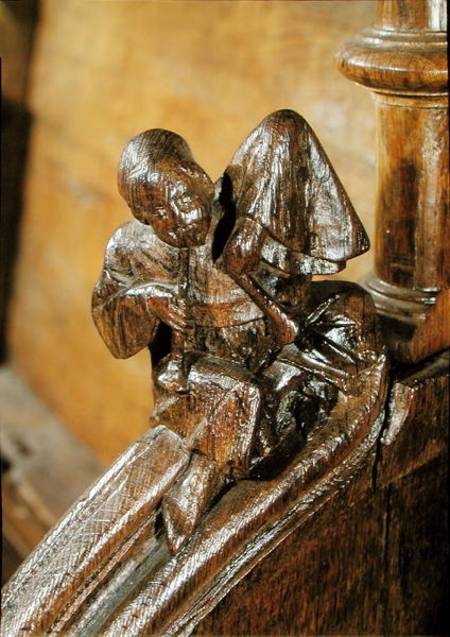 Musician playing a double flute, detail from a choir stall de French School