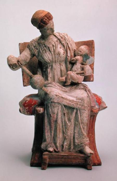 Figurine of Aphrodite playing with Eros, from Tanagra de Greek School
