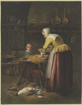 Frau und Kind in der Küche bei Karotten und Geflügel