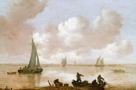 An estuary with fisherman hauling in their nets, with sailing boats behind