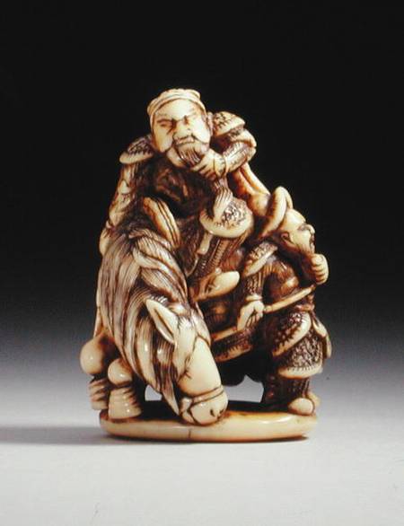 Netsuke in the form of a Chinese warrior on horseback with his attendant de Japanese School