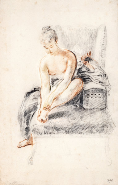 Semi-nude woman seated on a chaise longue, holding her foot (sanguine and black chalk on paper) de Jean Antoine Watteau