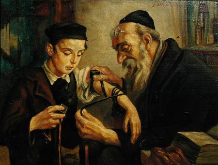A Rabbi tying the Phylacteries to the arm of a boy de Jewish School