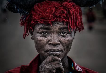Ethiopian woman in red.