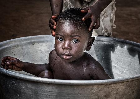Bath time in the streets of Accra - Ghana