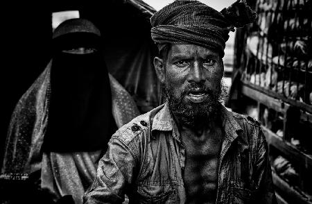 Rickshaw puller and his client.