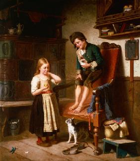 Two children with cat at a tiled stove
