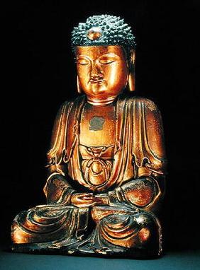 A figure of the seated Buddha (gold lacquer)