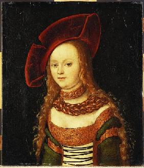 Portrait of a young girl, half length, wearing a green and gold costume with a red hat