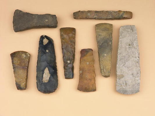 Collection of Neolithic to early Bronze Age weapon heads including Scandinavian stone battle and Dan de 
