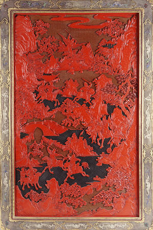 A Filigree Framed Red Lacquer Panel Depicting Warriors On Horseback And Mythical Animals In A Landca de 