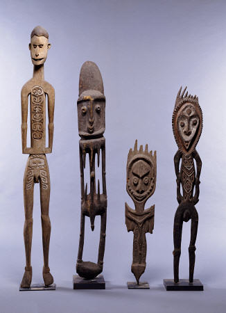 A Group Of Melanesian Figures Including An Asmat And Southern Abelam Male Figures And Karawari Cave de 