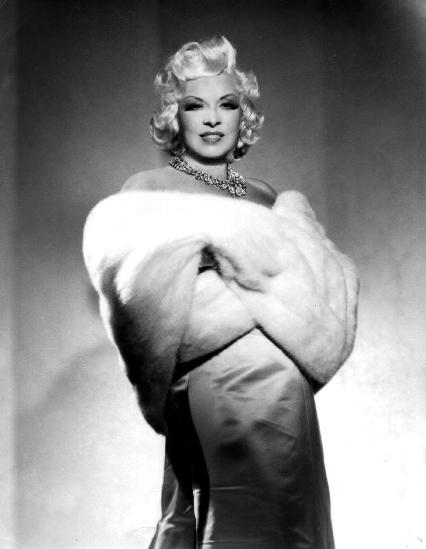 American Actress Mae West with fur stole de 