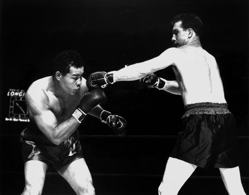 American boxer Joe Louis fighting with Billy Conn de 