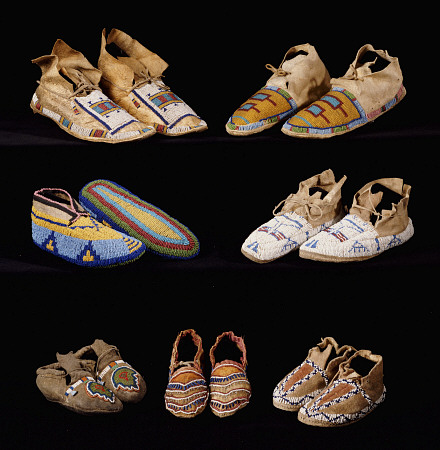 An Assortment Of Arapaho, Crow, Western Sioux, Apache And Blackfeet Adult And Child''s Beaded Hide M de 