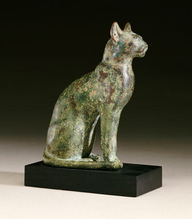 An Egyptian Bronze Figure Of A Cat de 