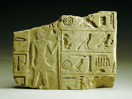 An Egyptian Limestone Relief Fragment de 