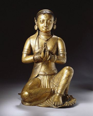 A Nepalese Embossed Gilt-Copper Figure Of A Worshipping Queen, Early 18th Century de 