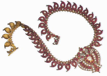 An Indian Ruby And Diamond Necklace With a Centre-Piece Designed As A Double-Peacock and Set With Ta de 