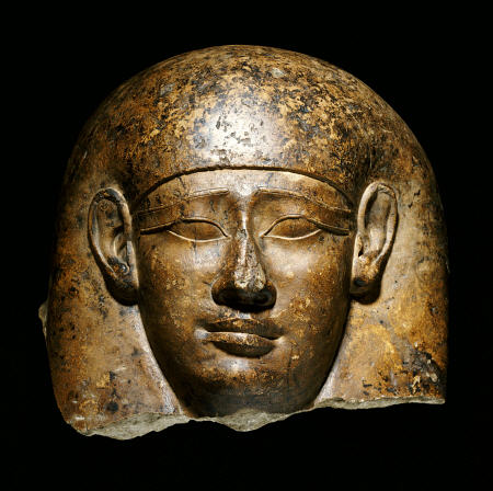 An Over Life-Size Limestone Head From An Anthropoid Sarcophagus de 