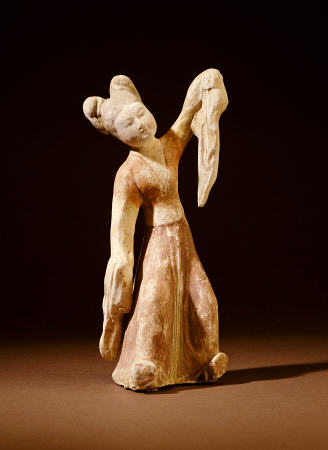 A Painted Pottery Figure Of A Dancer de 
