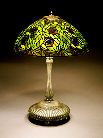 A ''Peacock'' Leaded Glass And Bronze Table Lamp de 