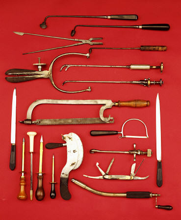 A Selection Of Medical Equipment Including Knives, Saws, Bullet Extractors,  Cauterisers, Lithotrite de 