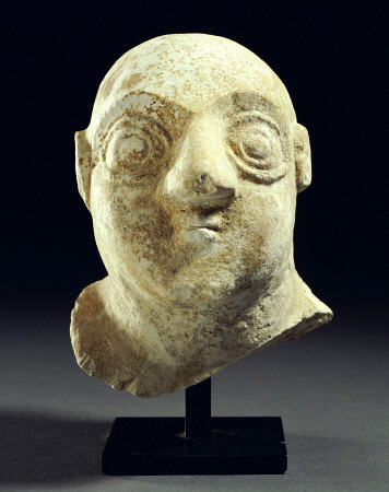 A Sumerian Limestone Head Of A Worshipper de 