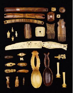 A Selection Of North American Inuit, African And Asian Ivory Carvings