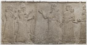 Carved relief of Tiglath-Pileser III receiving homage from a vanquished warrior, south-west palace, 